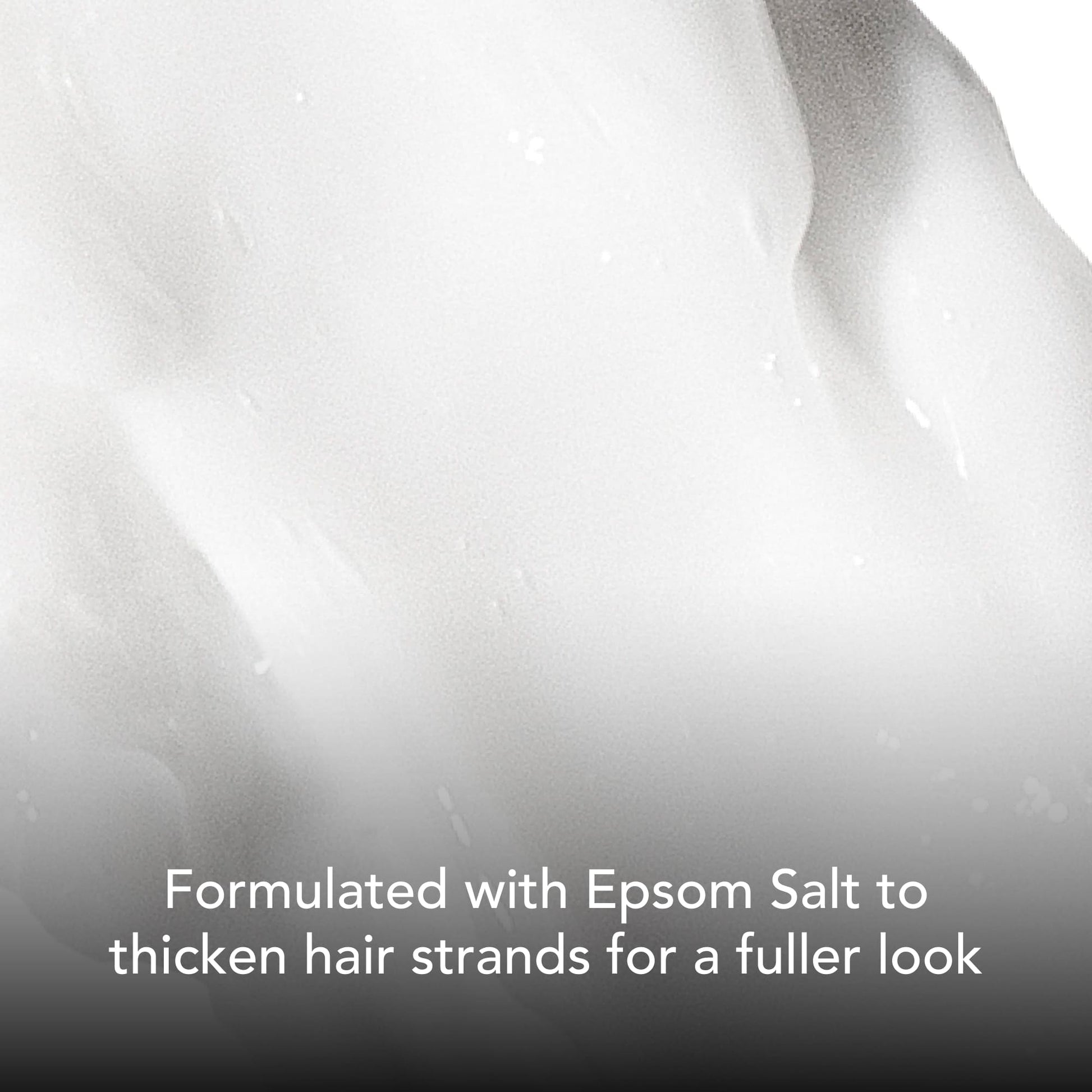 Close-up texture of BLUMAAN Volume Cream with text highlighting Epsom Salt for thicker, fuller hair strands